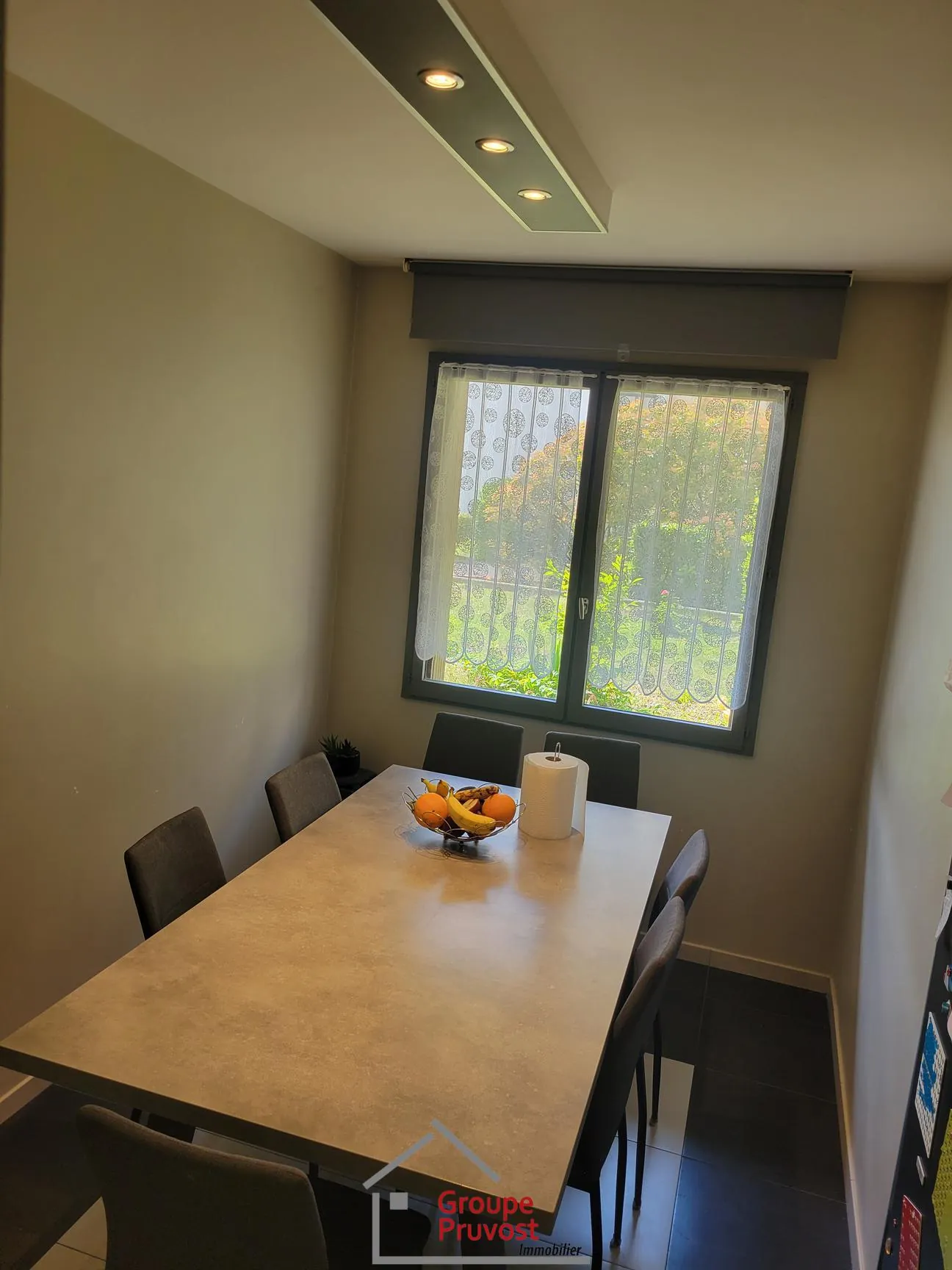 Bel appartement T4 en rez-de-jardin à Roanne avec 3 chambres et jardin commun 