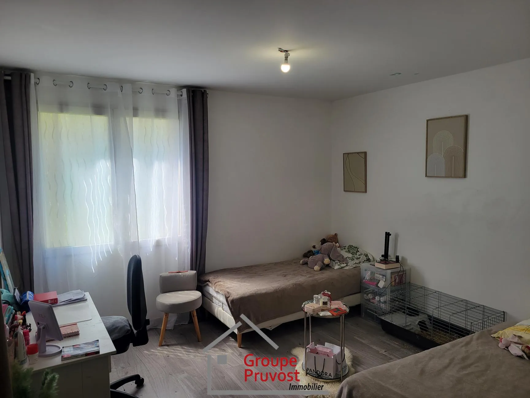 Bel appartement T4 en rez-de-jardin à Roanne avec 3 chambres et jardin commun 