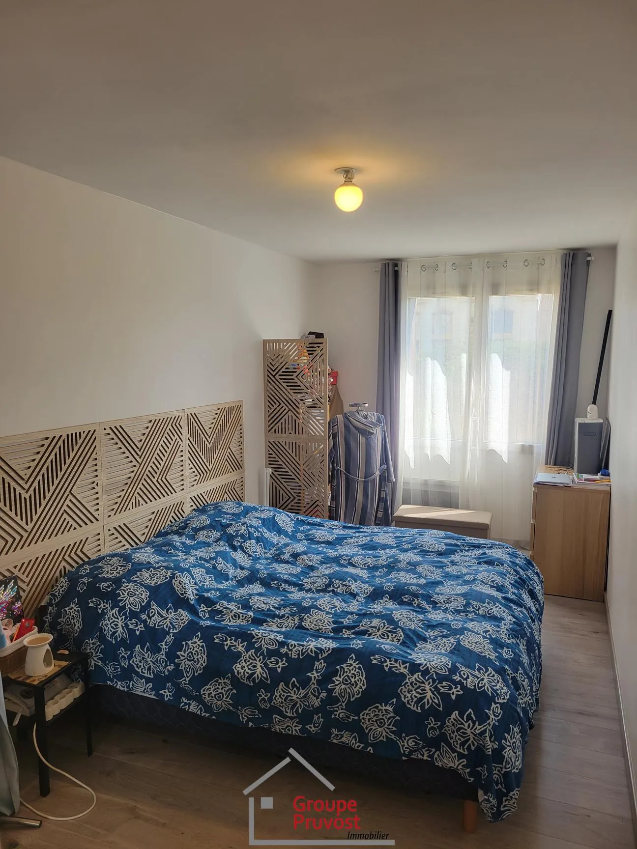 Bel appartement T4 en rez-de-jardin à Roanne avec 3 chambres et jardin commun 
