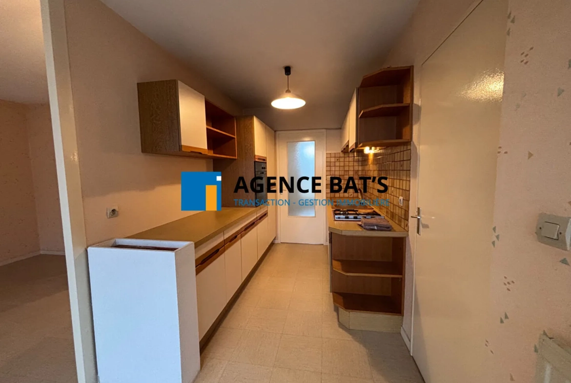 Appartement T3 à Saint-Étienne avec garage, balcons et vue sur parc, secteur Bellevue 