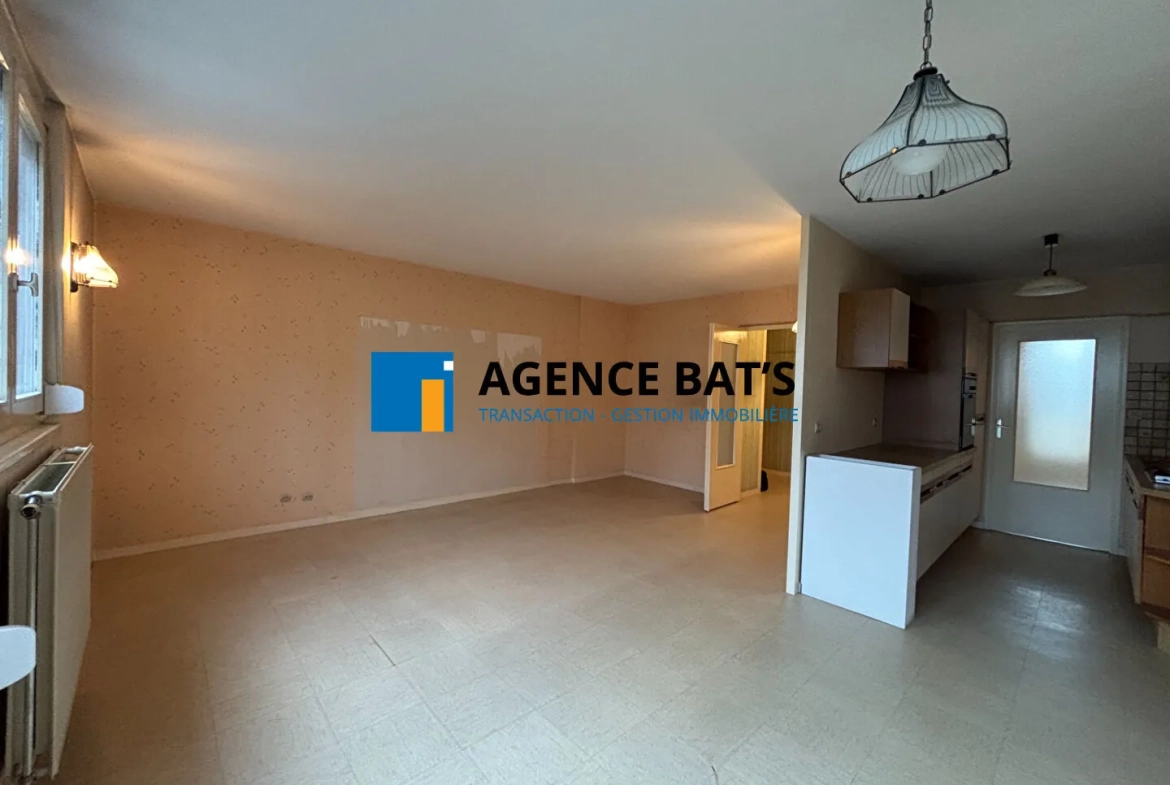 Appartement T3 à Saint-Étienne avec garage, balcons et vue sur parc, secteur Bellevue 