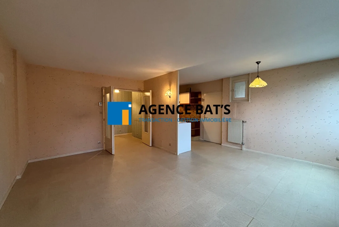 Appartement T3 à Saint-Étienne avec garage, balcons et vue sur parc, secteur Bellevue 