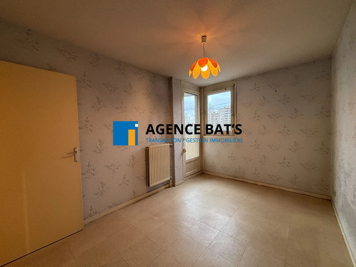 Appartement T3 à Saint-Étienne avec garage, balcons et vue sur parc, secteur Bellevue 