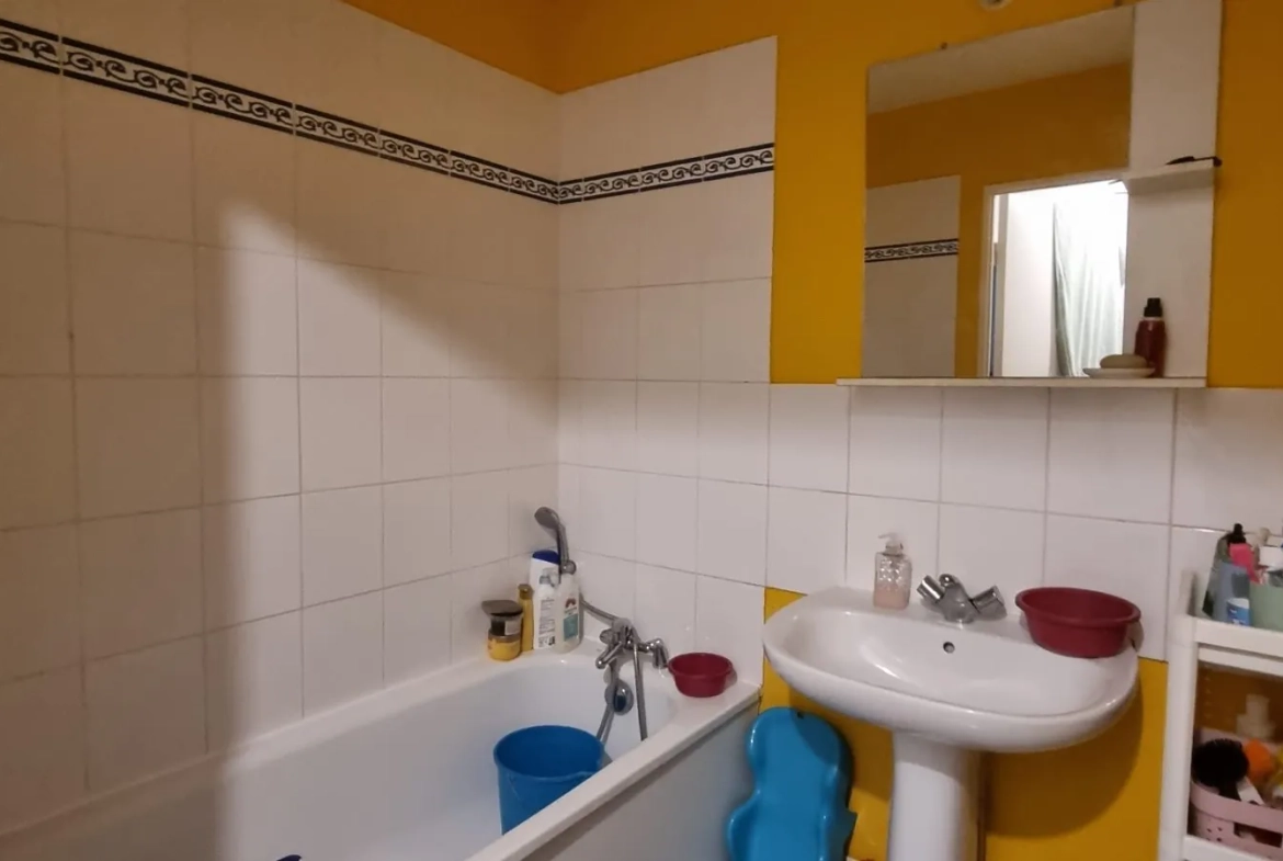Appartement 3 pièces avec balcon à vendre à Osny, quartier Les Louvrais 