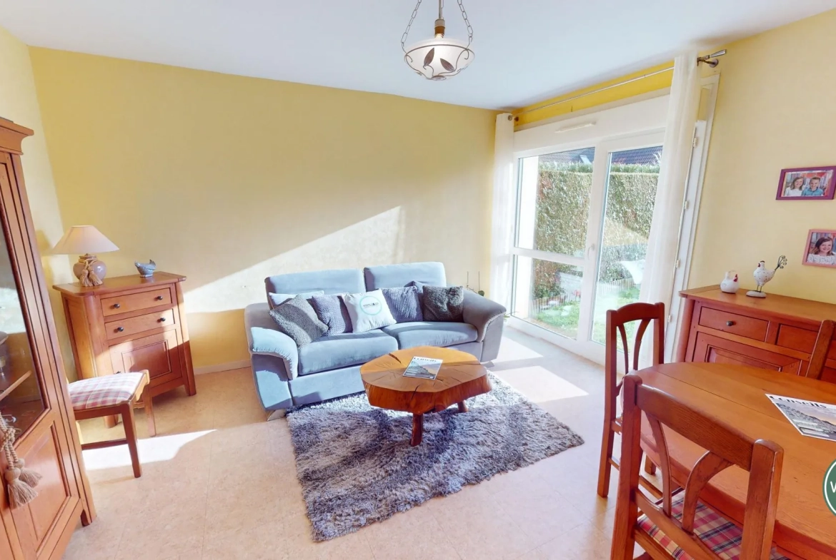 Maison familiale à Cuverville, 2 chambres, garage et jardin au sud 