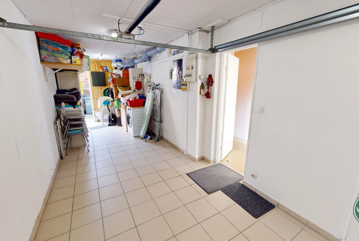 Maison familiale à Cuverville, 2 chambres, garage et jardin au sud 