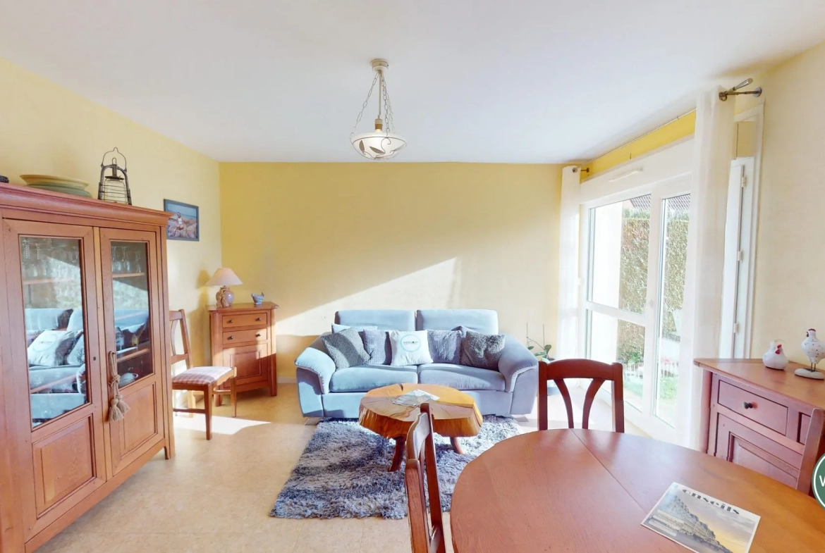 Maison familiale à Cuverville, 2 chambres, garage et jardin au sud 