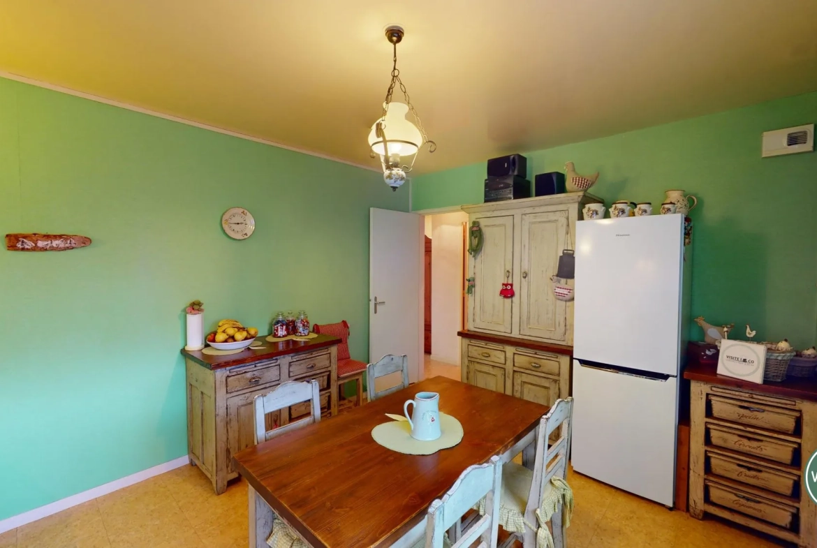 Maison familiale à Cuverville, 2 chambres, garage et jardin au sud 