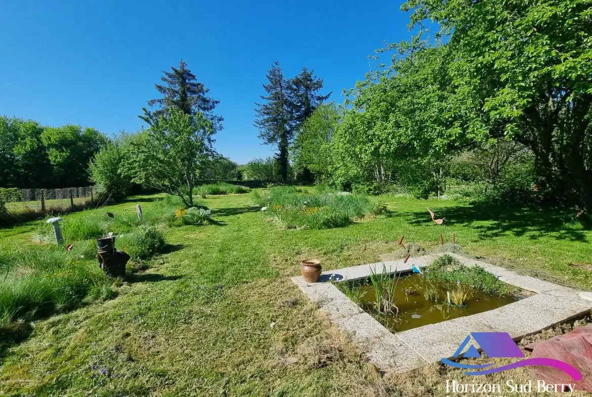 Maison de plain-pied avec dépendance et jardin à Aigurande 