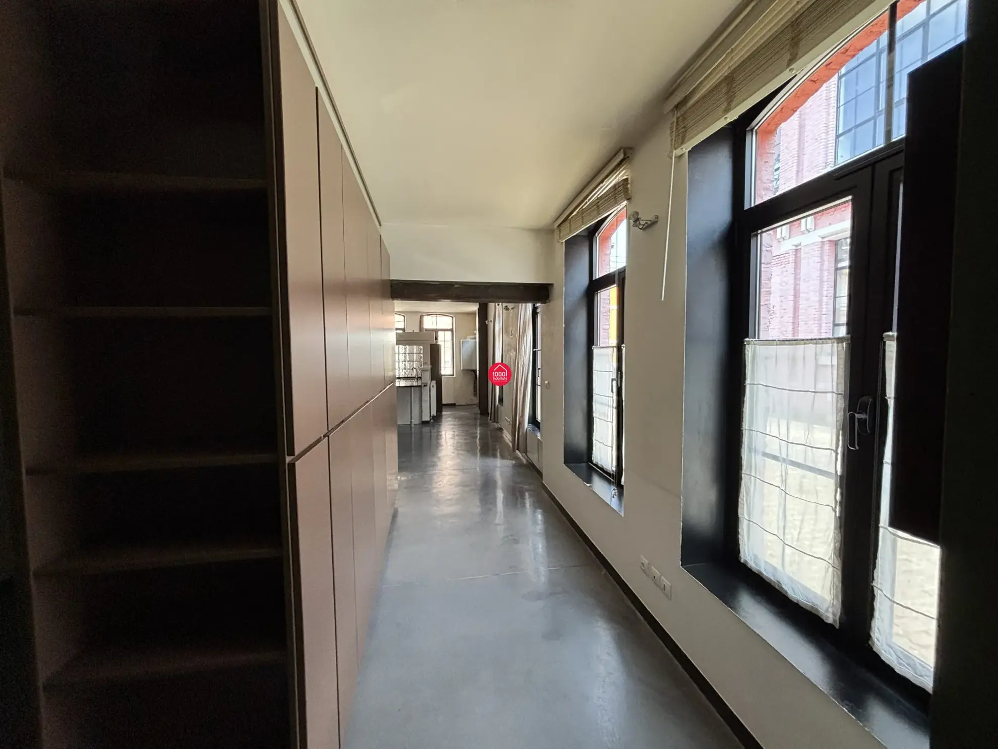 Loft industriel de 66 m² avec 2 chambres, rénové dans une ancienne usine à Roubaix 