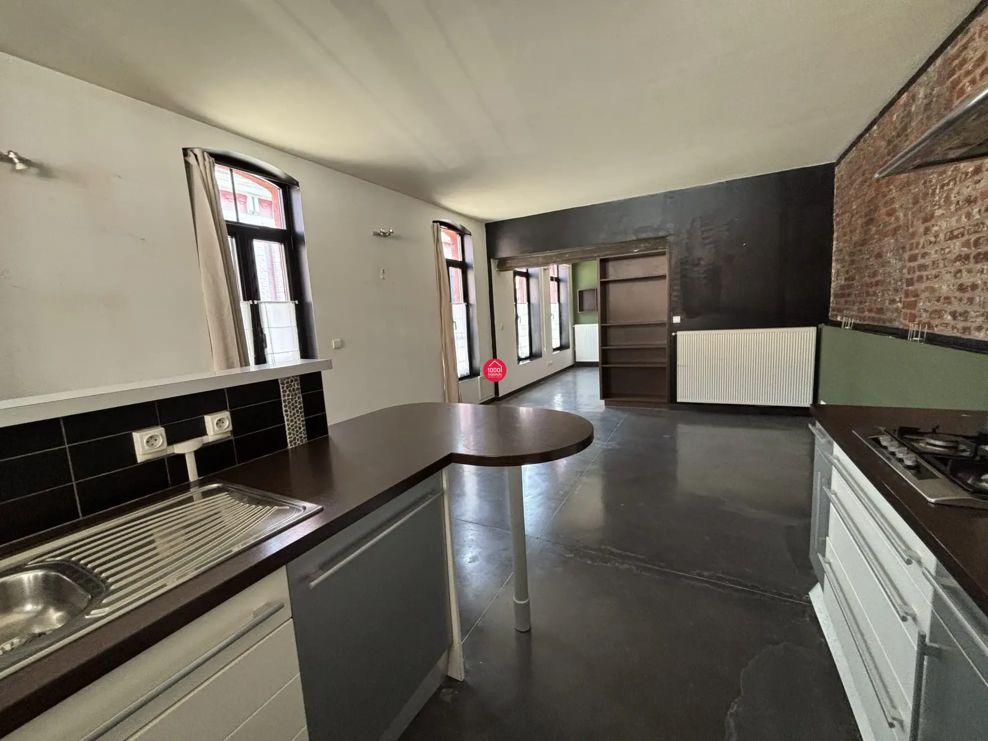 Loft industriel de 66 m² avec 2 chambres, rénové dans une ancienne usine à Roubaix 