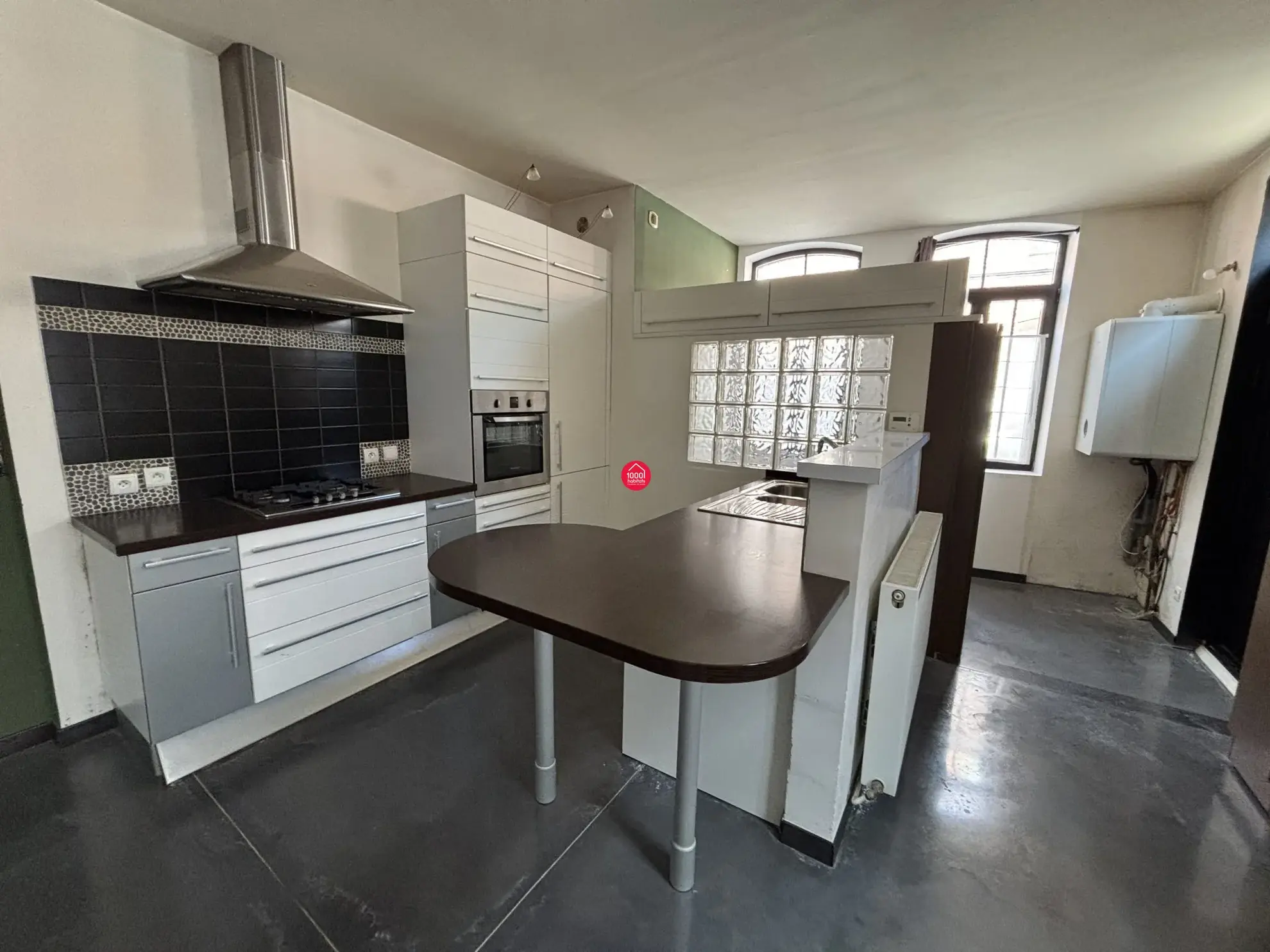 Loft industriel de 66 m² avec 2 chambres, rénové dans une ancienne usine à Roubaix 