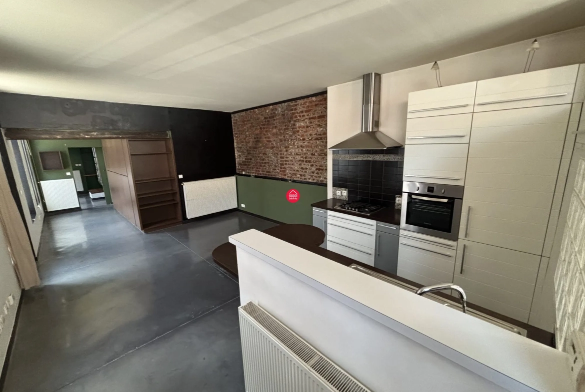 Loft industriel de 66 m² avec 2 chambres, rénové dans une ancienne usine à Roubaix 