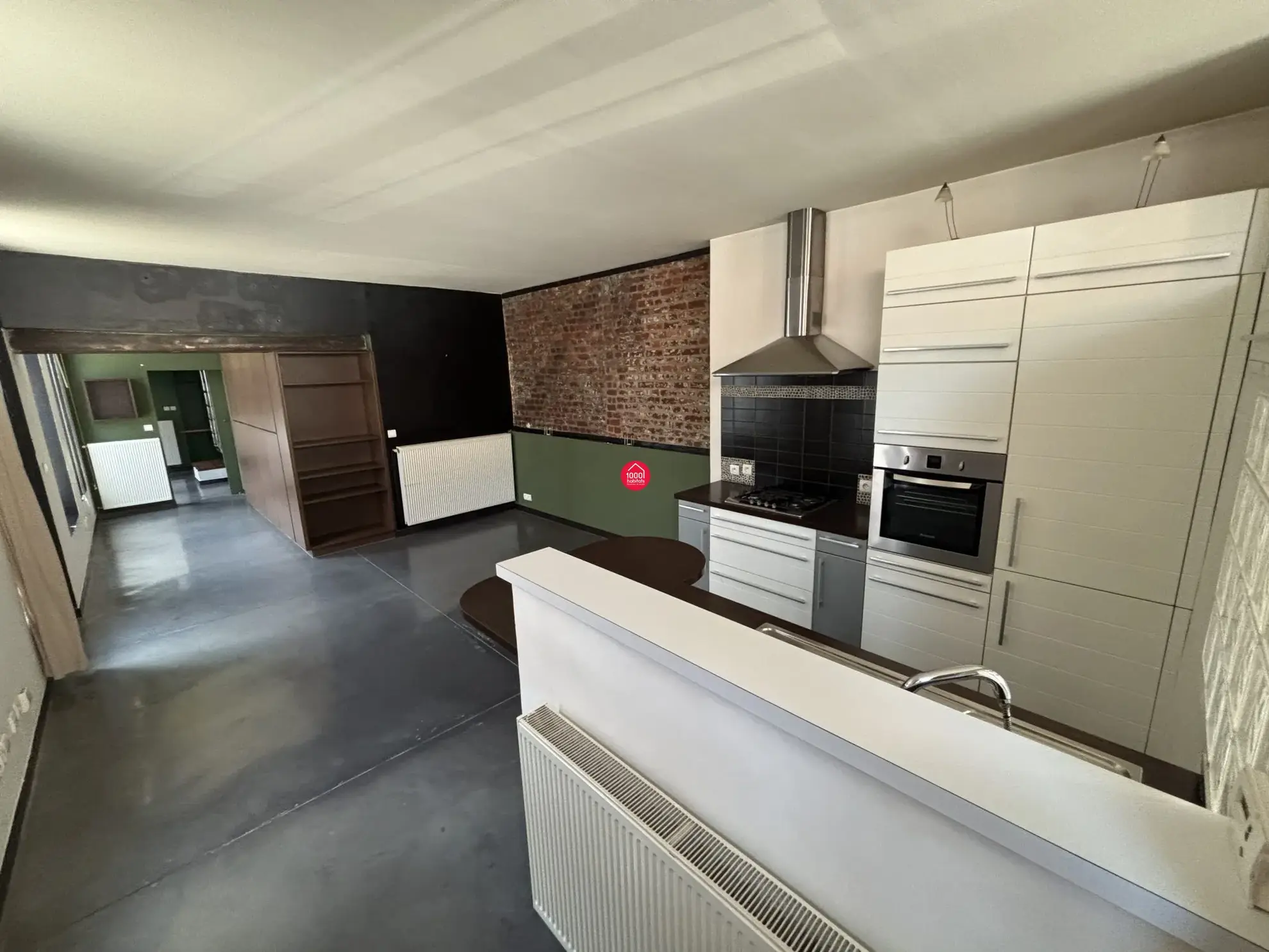 Loft industriel de 66 m² avec 2 chambres, rénové dans une ancienne usine à Roubaix 