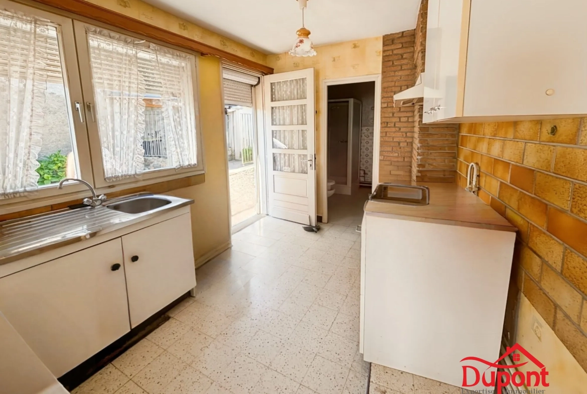 Maison semi-individuelle à Haveluy avec grand jardin et potentiel de rénovation 