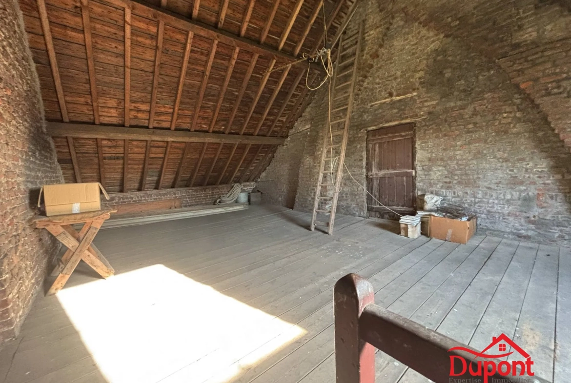 Maison semi-individuelle à Haveluy avec grand jardin et potentiel de rénovation 