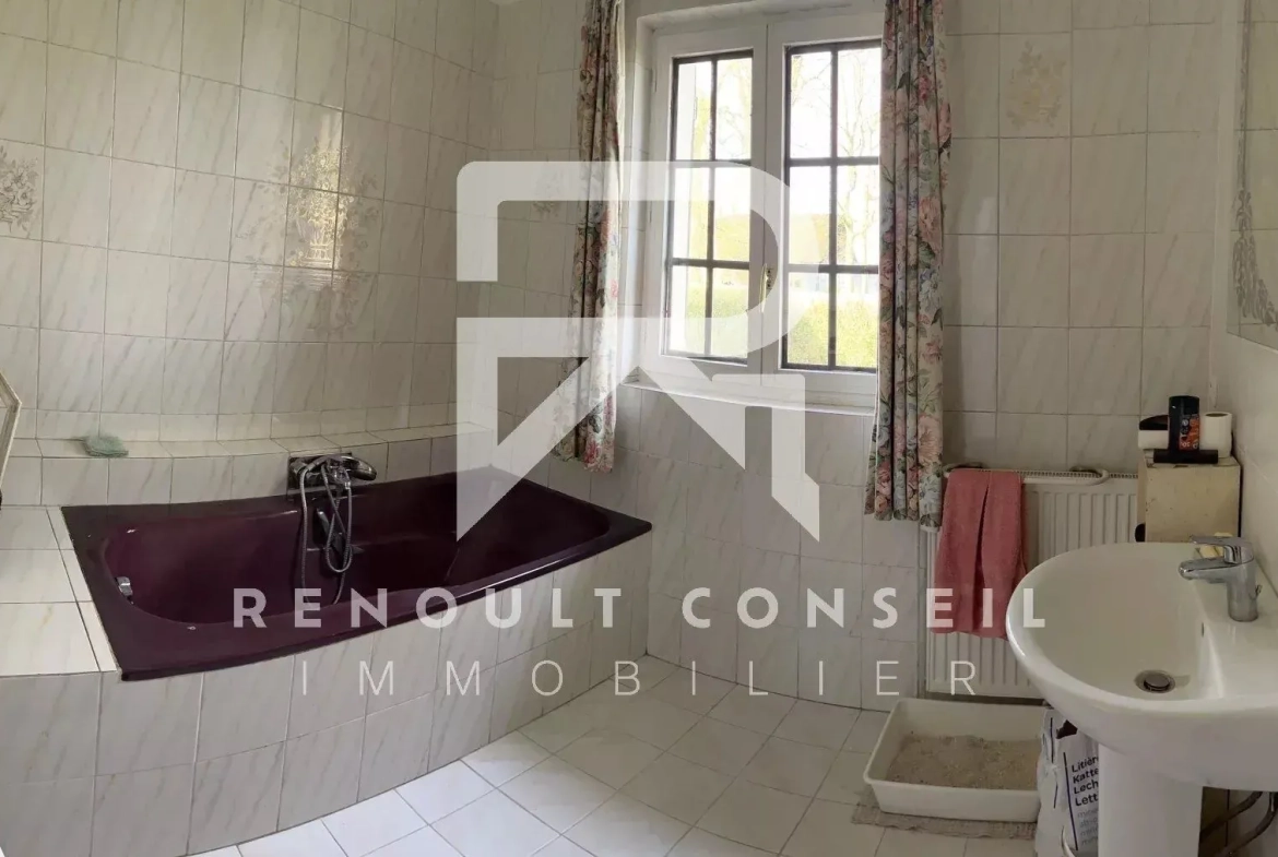 Maison individuelle avec grand terrain et sous-sol à Clères 