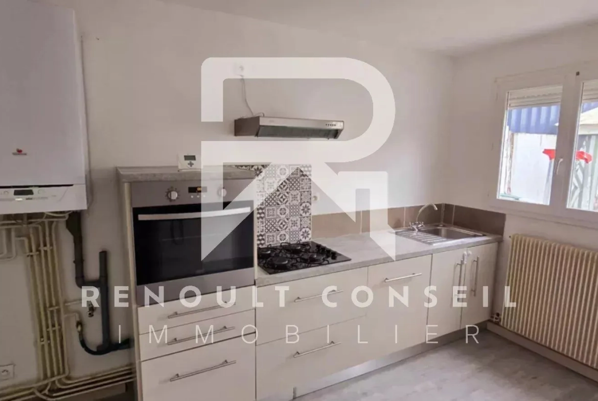 Maison de ville de 64 m² à Petit-Quevilly avec terrasse et potentiel locatif 