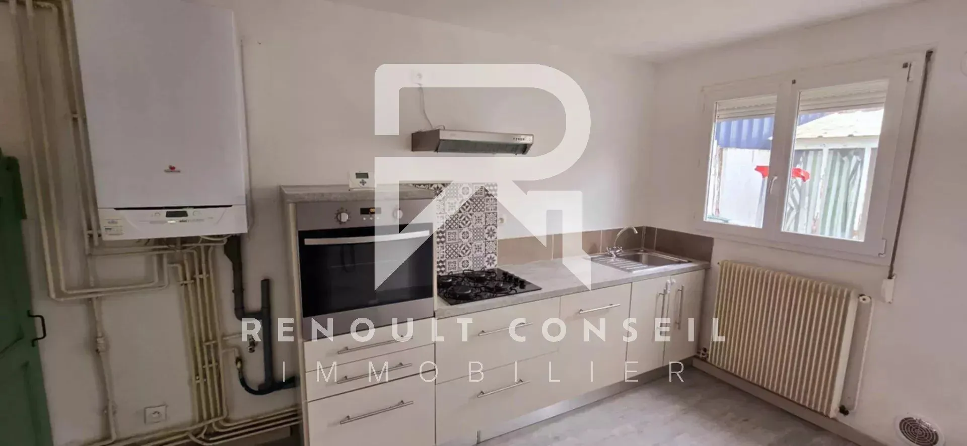 Maison de ville de 64 m² à Petit-Quevilly avec terrasse et potentiel locatif 