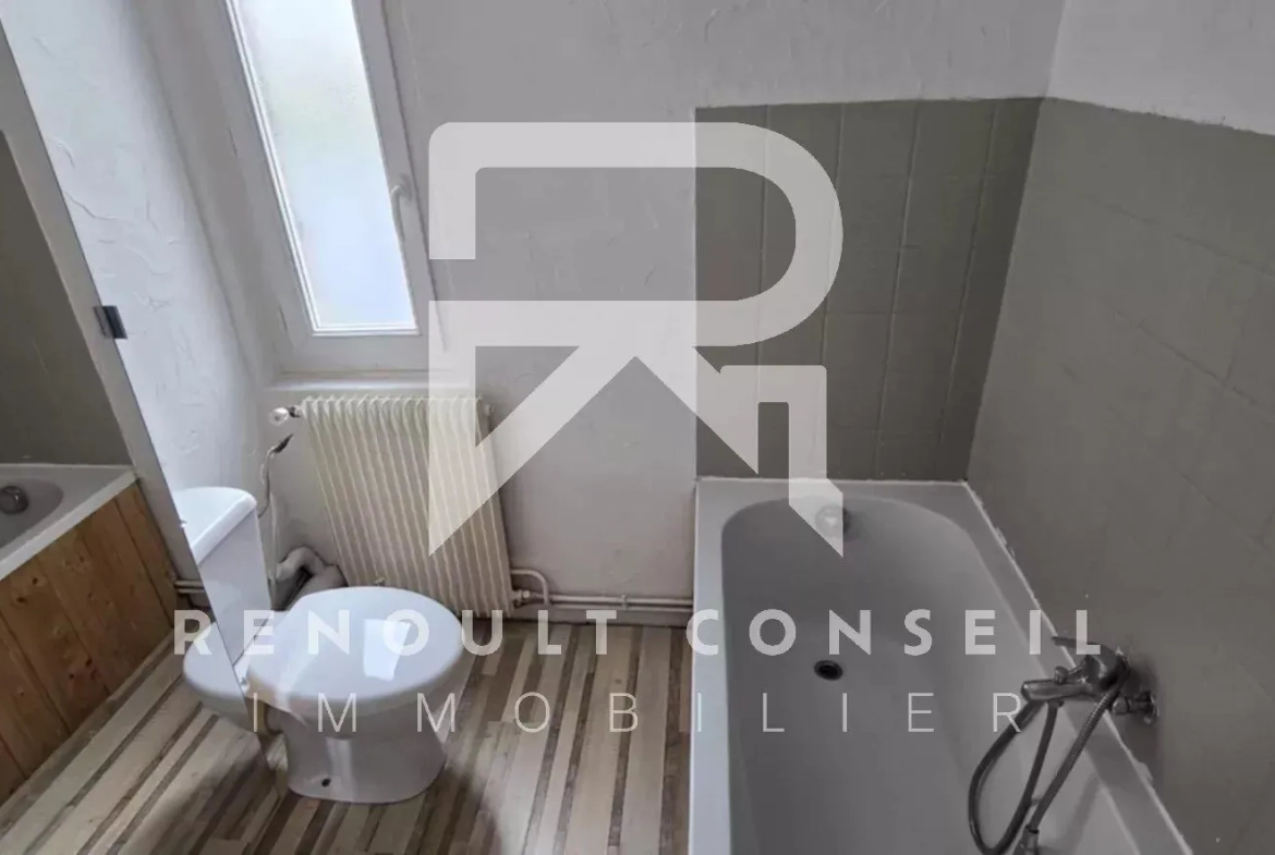 Maison de ville de 64 m² à Petit-Quevilly avec terrasse et potentiel locatif 