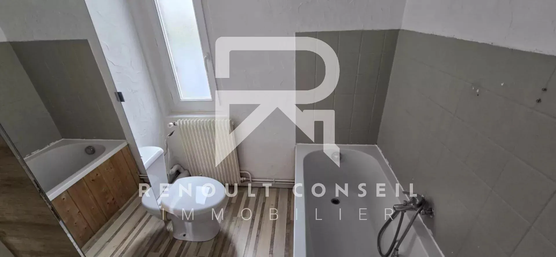 Maison de ville de 64 m² à Petit-Quevilly avec terrasse et potentiel locatif 