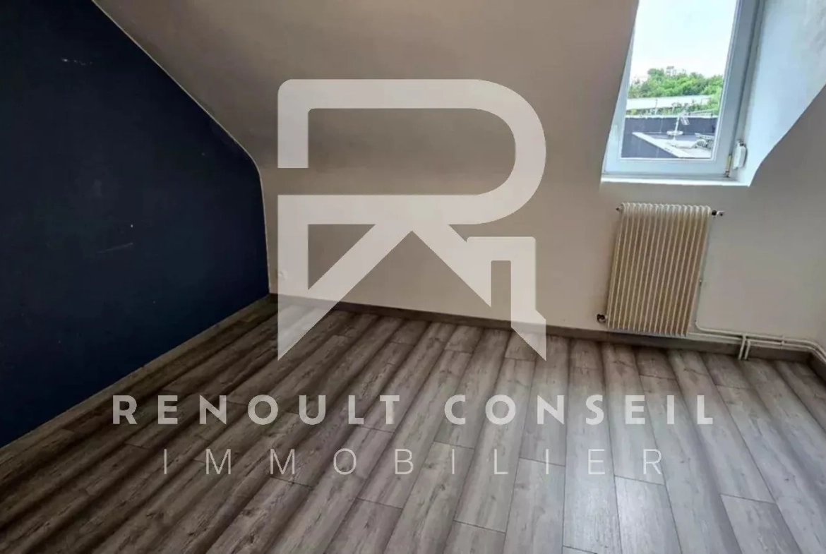 Maison de ville de 64 m² à Petit-Quevilly avec terrasse et potentiel locatif 