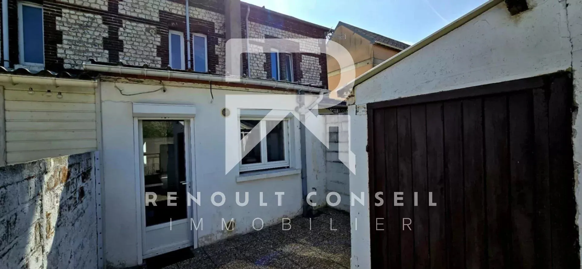 Maison de ville de 64 m² à Petit-Quevilly avec terrasse et potentiel locatif 