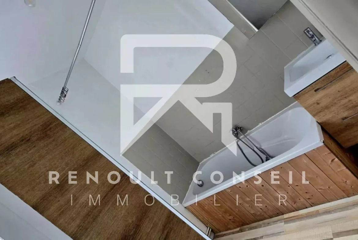 Maison de ville de 64 m² à Petit-Quevilly avec terrasse et potentiel locatif 