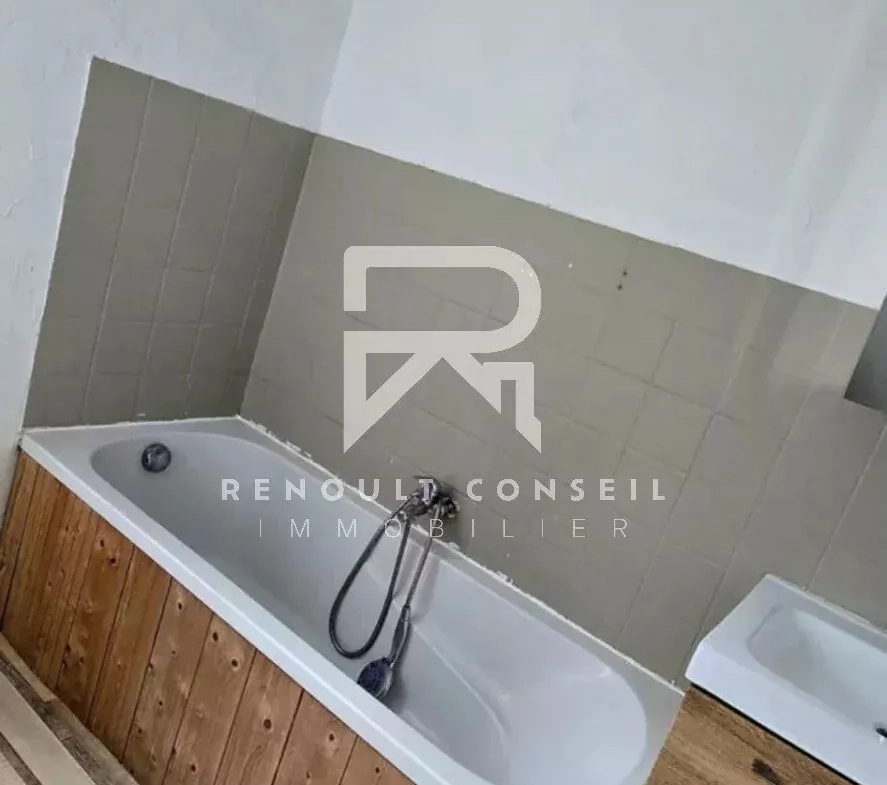 Maison de ville de 64 m² à Petit-Quevilly avec terrasse et potentiel locatif 