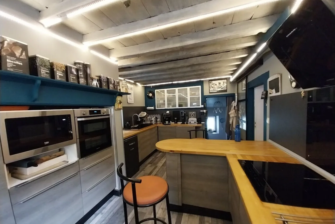 Maison chaleureuse de 145m² à Haut de Bosdarros avec jardin et dépendances 