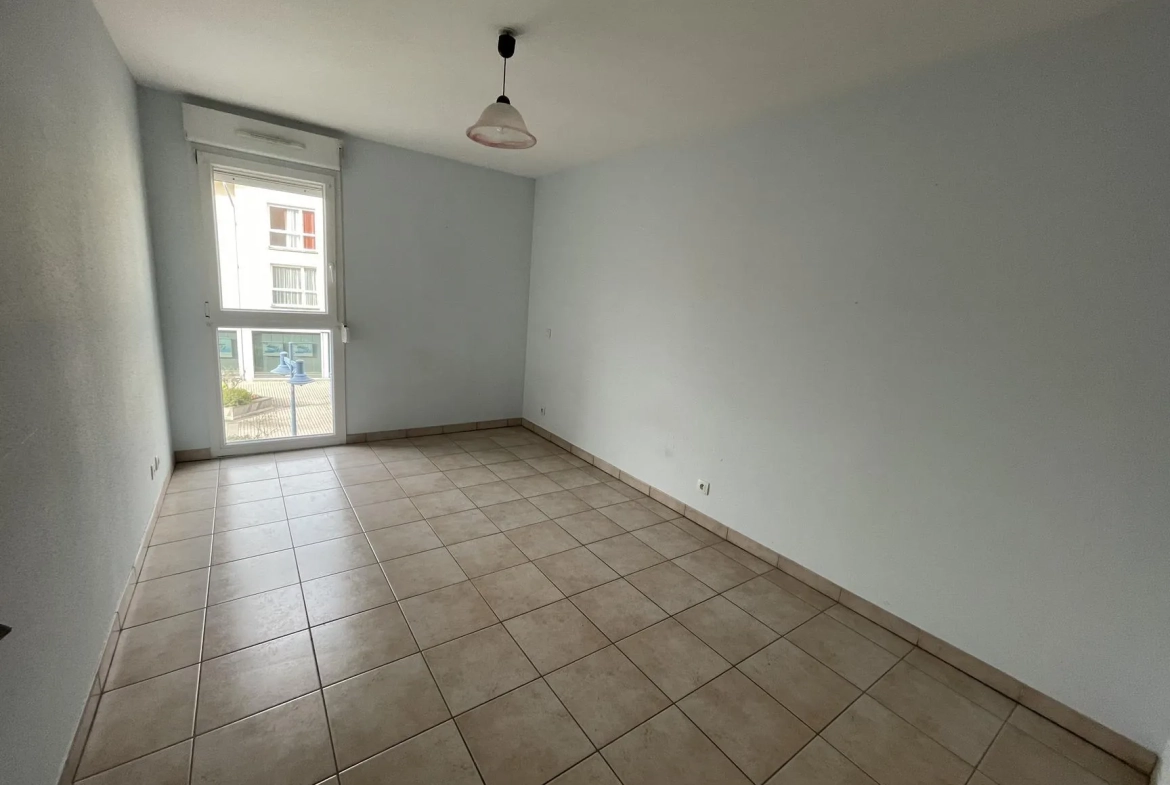 Appartement T5 avec terrasse, garage et ascenseur à Golbey - Prix 218 000 € 