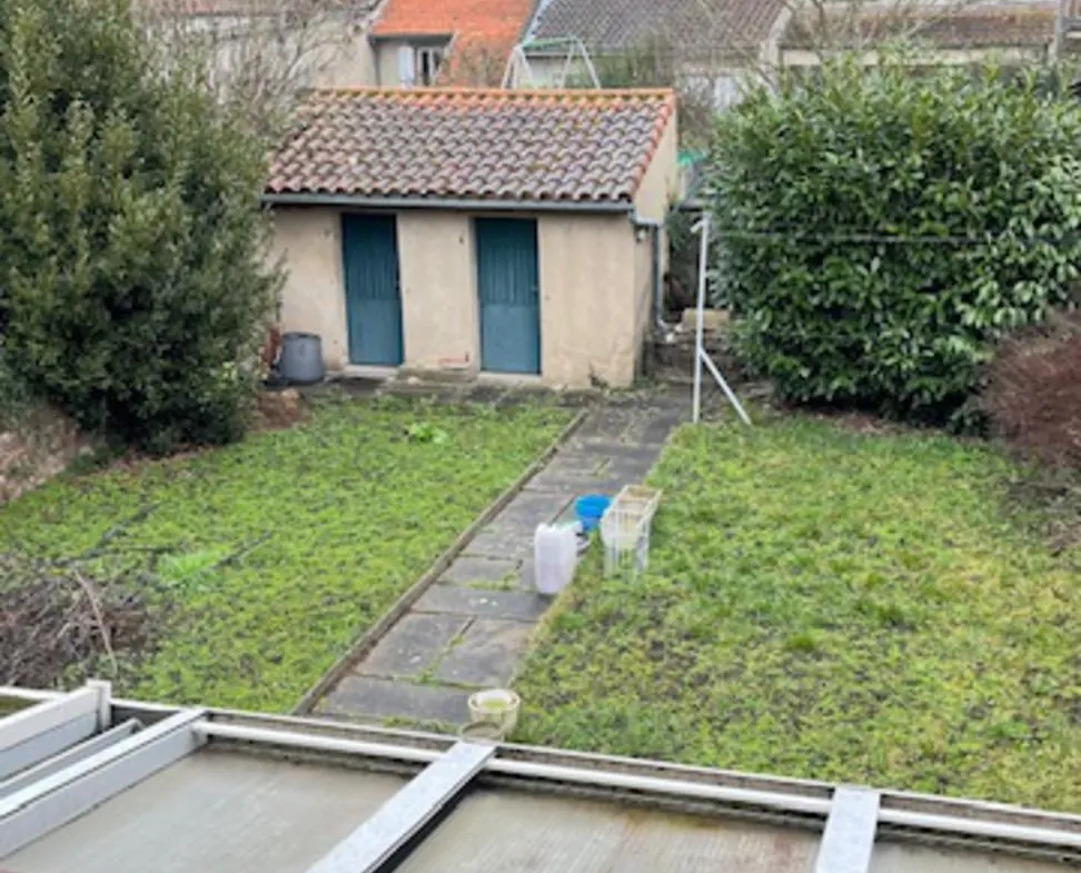 Maison lumineuse à Carmaux avec 4 chambres et jardin, proche commerces 