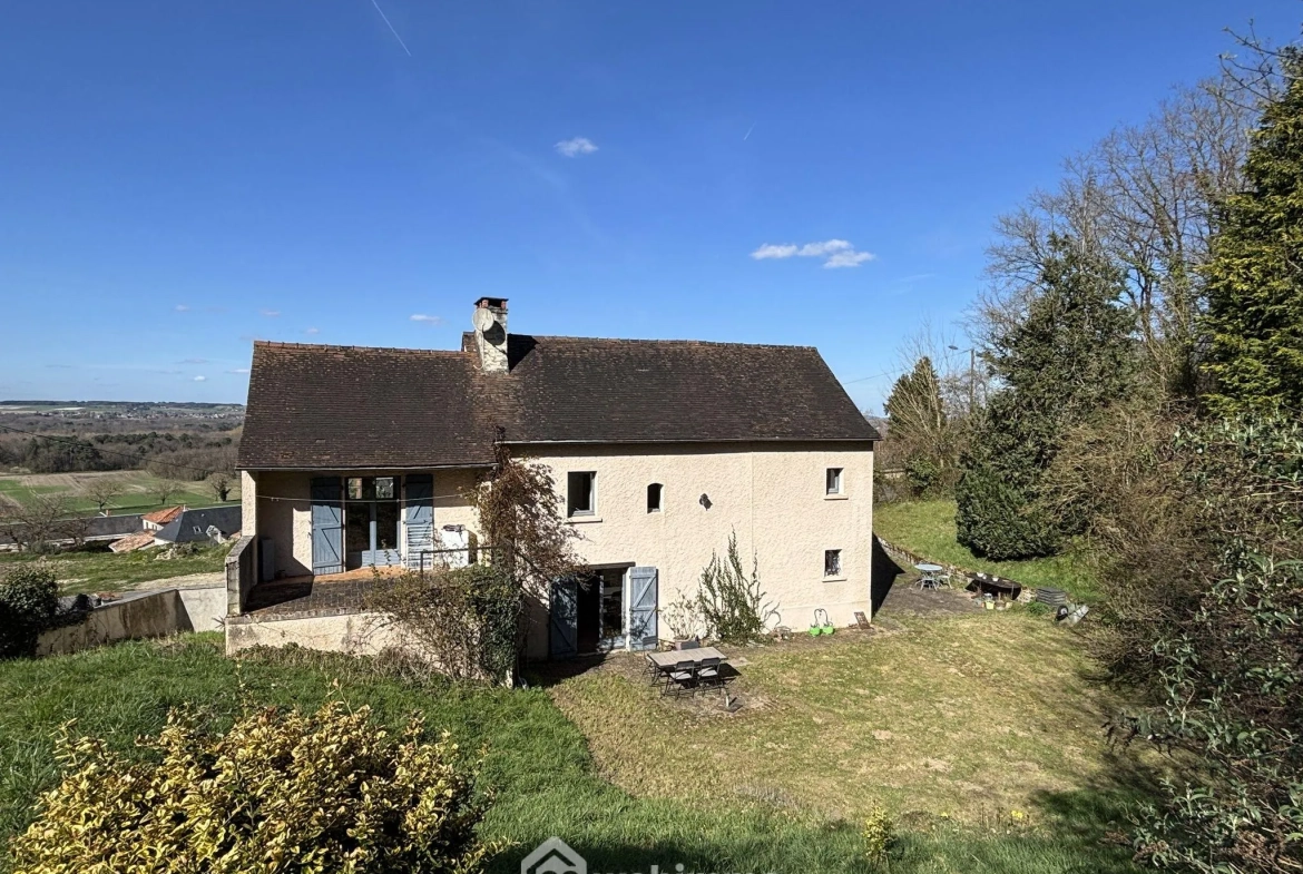 Maison en pierre avec extension à Colombiers - 107 m², 3 chambres, garage, terrain boisé 