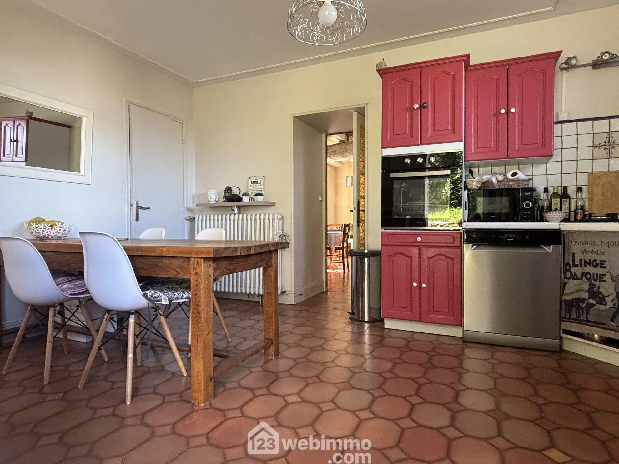 Maison en pierre avec extension à Colombiers - 107 m², 3 chambres, garage, terrain boisé 