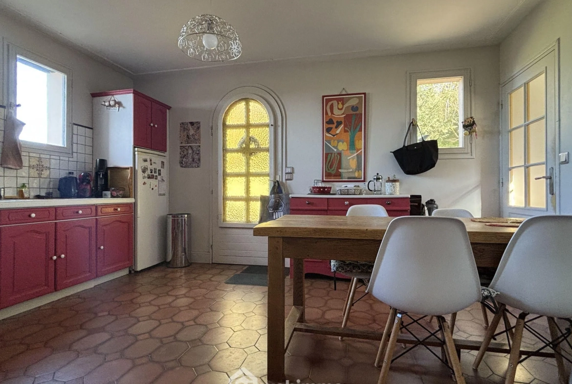 Maison en pierre avec extension à Colombiers - 107 m², 3 chambres, garage, terrain boisé 