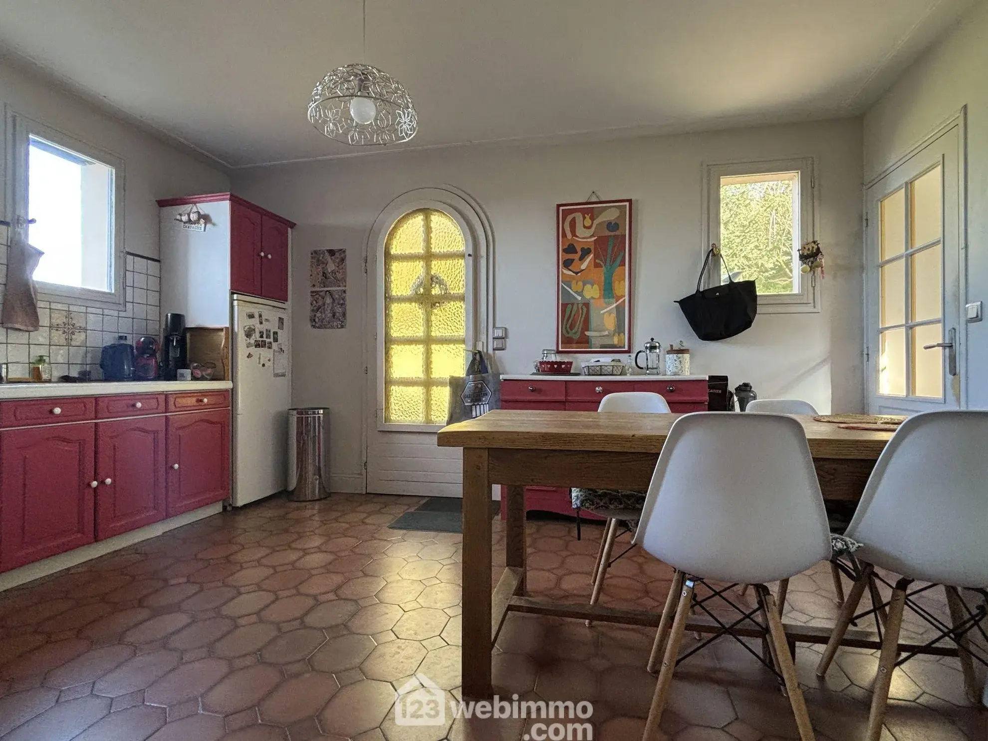 Maison en pierre avec extension à Colombiers - 107 m², 3 chambres, garage, terrain boisé 