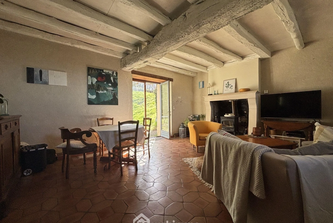 Maison en pierre avec extension à Colombiers - 107 m², 3 chambres, garage, terrain boisé 