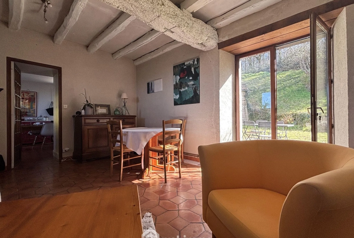 Maison en pierre avec extension à Colombiers - 107 m², 3 chambres, garage, terrain boisé 
