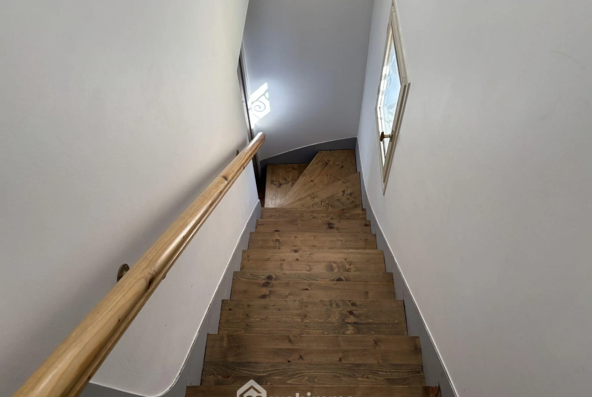 Maison en pierre avec extension à Colombiers - 107 m², 3 chambres, garage, terrain boisé 