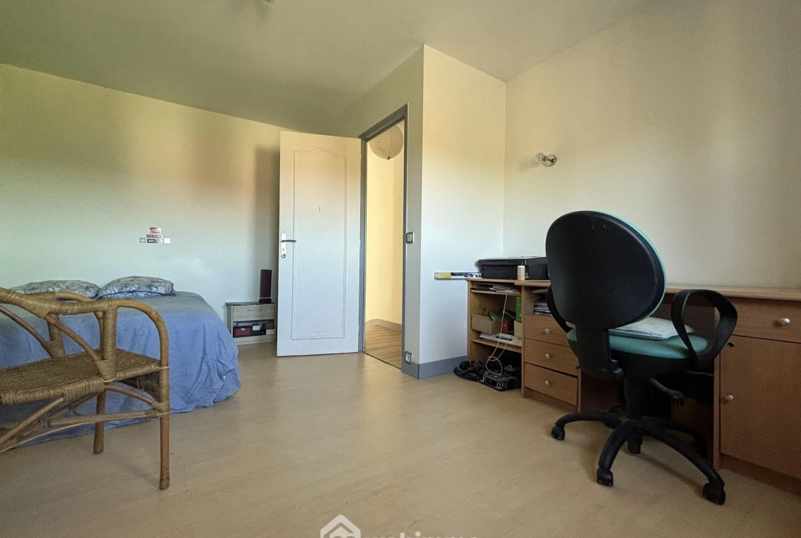 Maison en pierre avec extension à Colombiers - 107 m², 3 chambres, garage, terrain boisé 