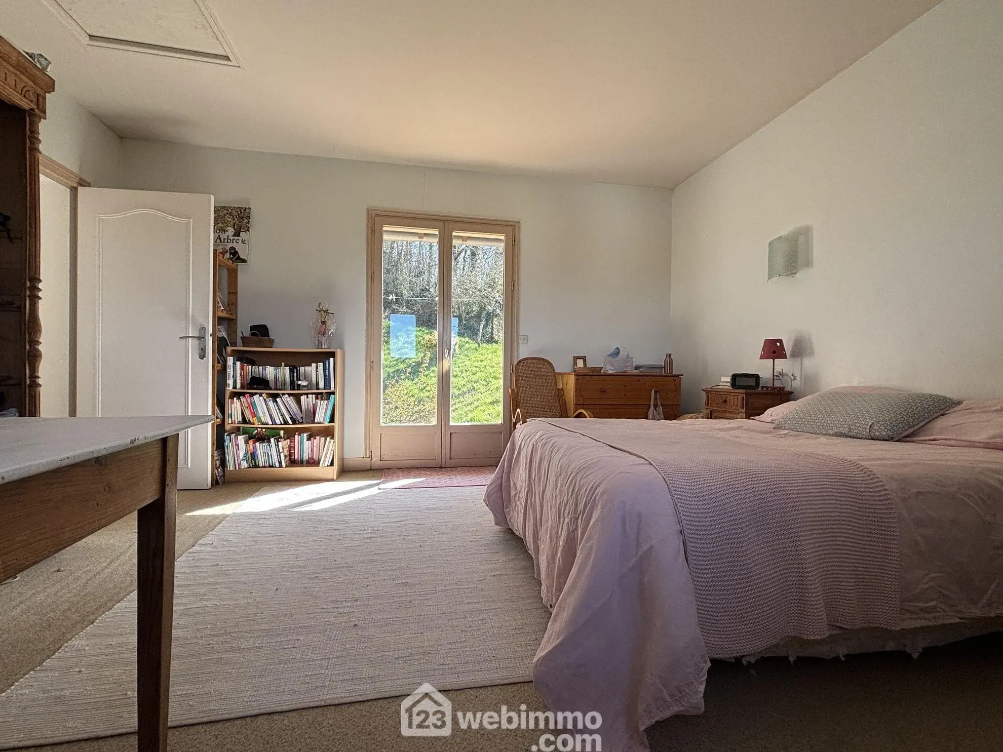 Maison en pierre avec extension à Colombiers - 107 m², 3 chambres, garage, terrain boisé 