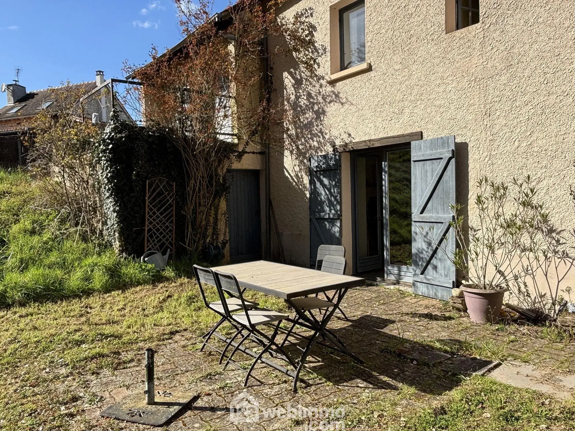 Maison en pierre avec extension à Colombiers - 107 m², 3 chambres, garage, terrain boisé 