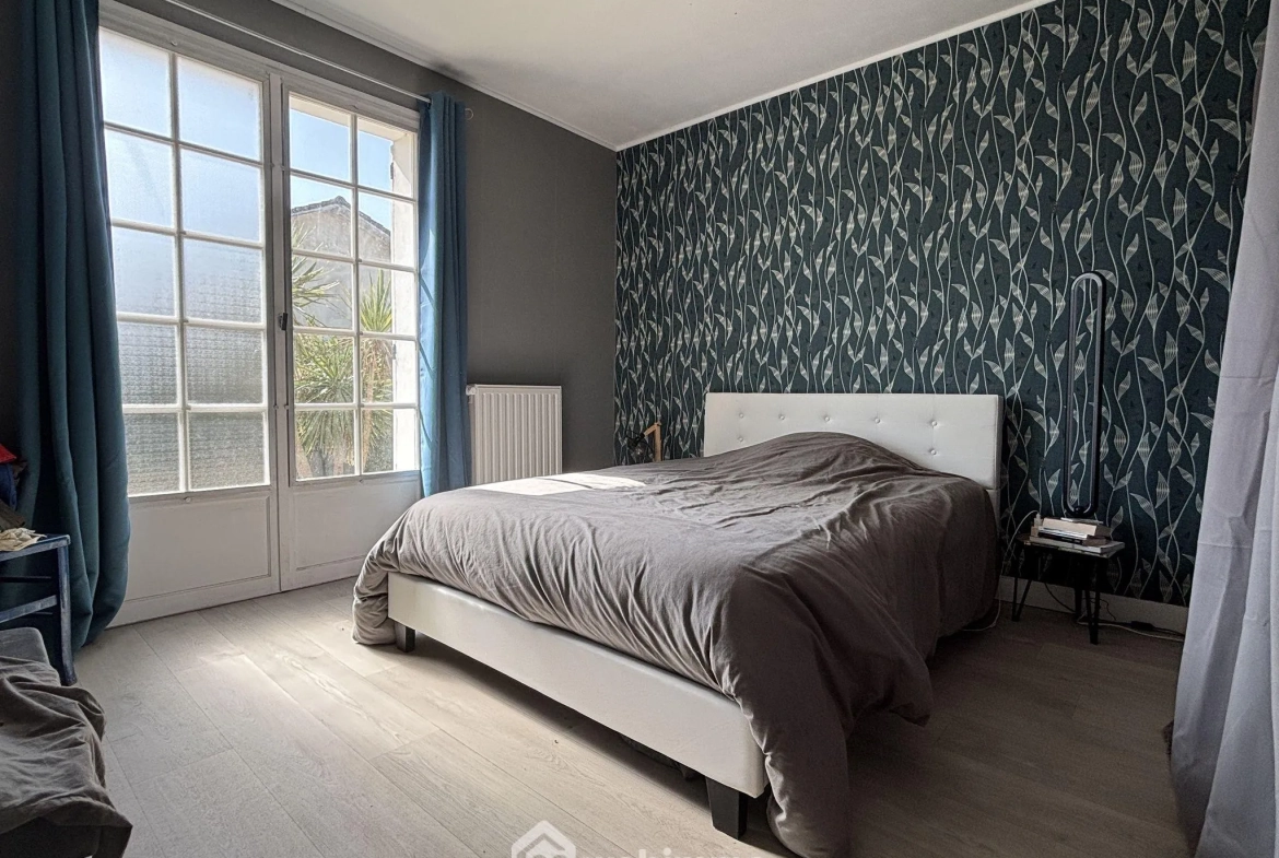 Maison de plain-pied 114 m² à Châtellerault avec 4 chambres et terrasse 
