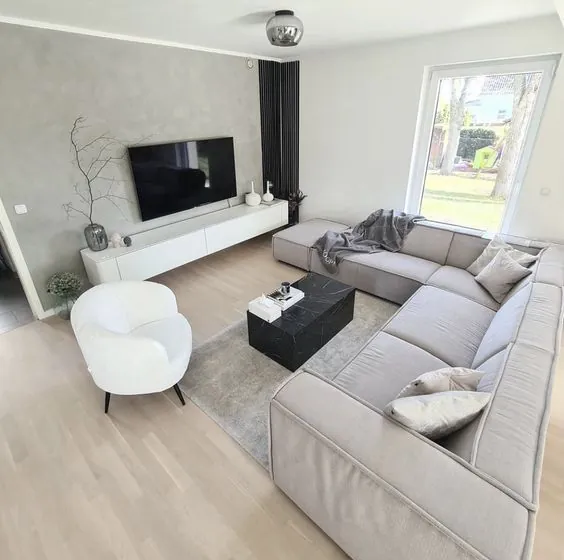 Maison moderne à Rouxmesnil-Bouteilles avec 3 chambres, garage et grande pièce de vie 