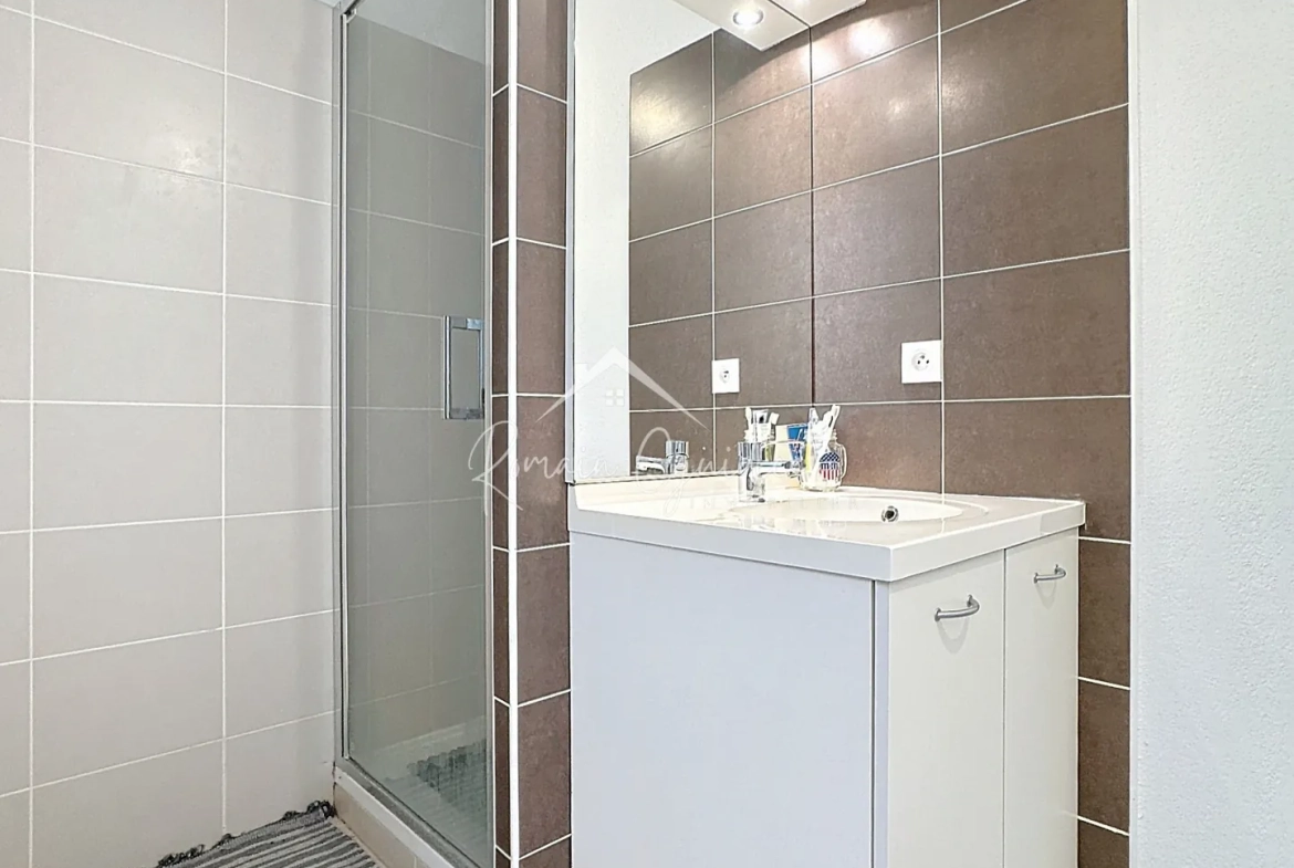 Appartement T3 de 66 m² avec jardin et parking à Millau 