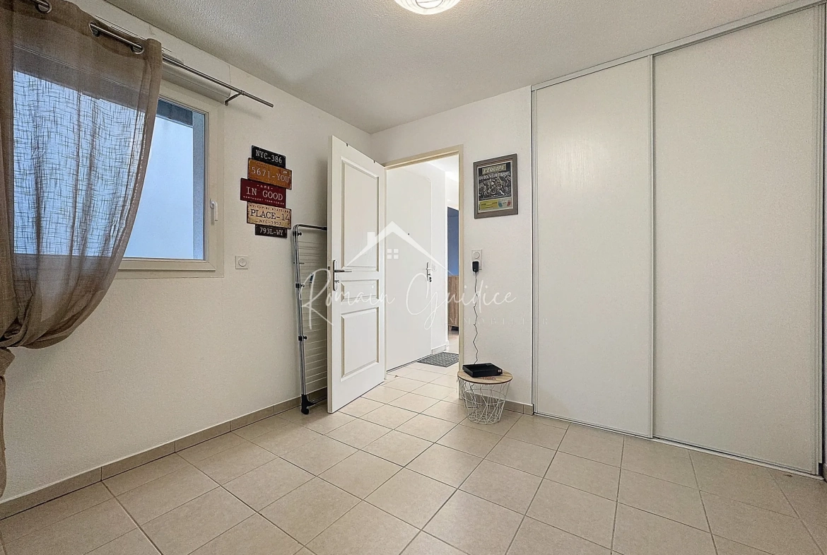 Appartement T3 de 66 m² avec jardin et parking à Millau 