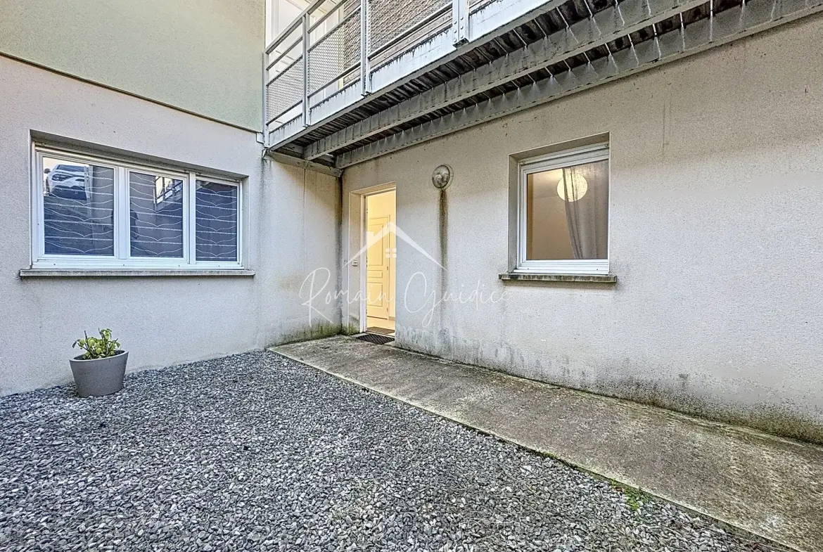 Appartement T3 de 66 m² avec jardin et parking à Millau 