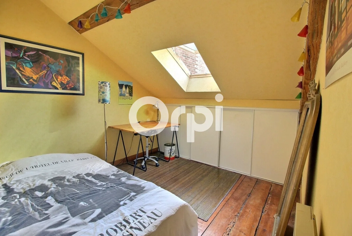 Appartement ancien en dernier étage à Pau avec 2 chambres et faibles charges 