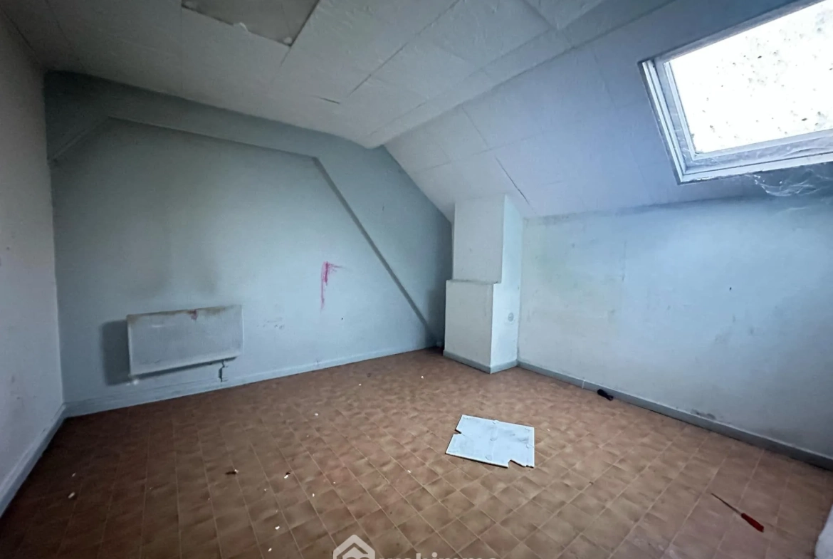 Maison de ville à Guise de 85 m² avec potentiel de rénovation 