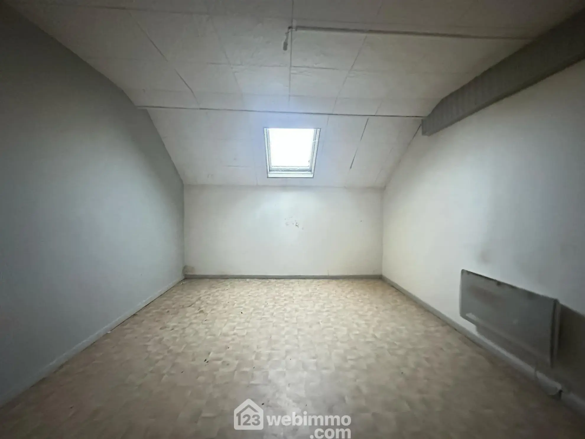 Maison de ville à Guise de 85 m² avec potentiel de rénovation 